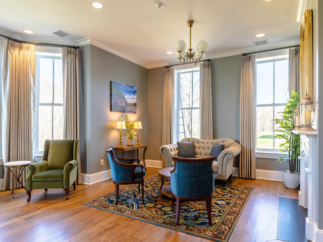 The Grayson Parlor at The Inn at Foster Falls — bright sitting room with tall windows